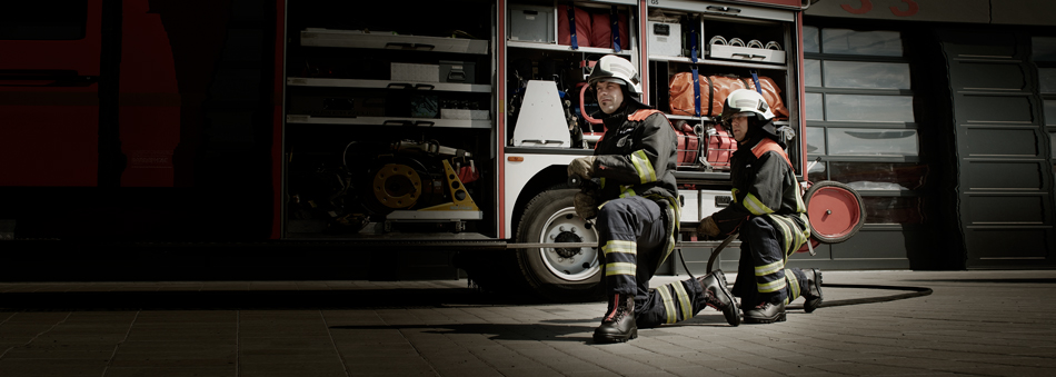 Voelkl Firefighting boots in action with 2 firemen of the Dresden fire department. 